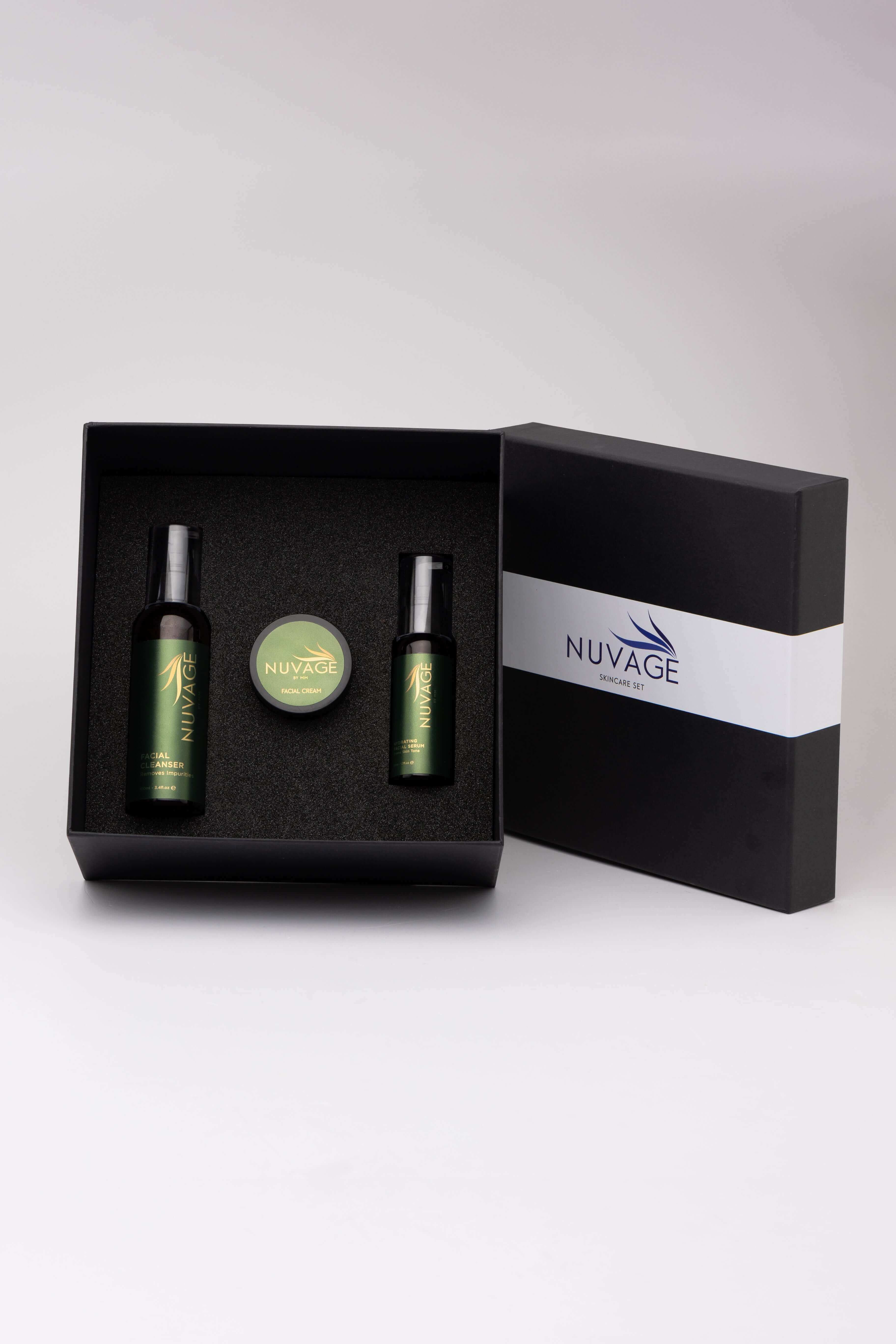 NUVAGE skincare routine complete set in black packaging with green skincare products.